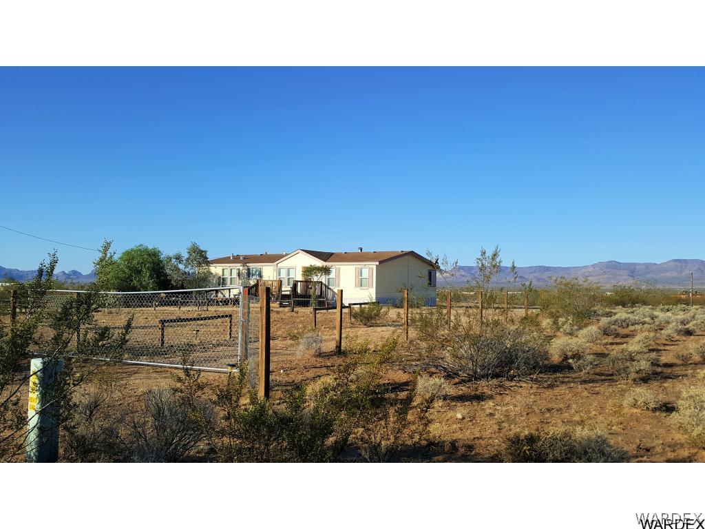 5341 North Laguna Road Golden Valley, AZ 86413 - Photo 2 of 31 Fenced wtwo drive thru gates