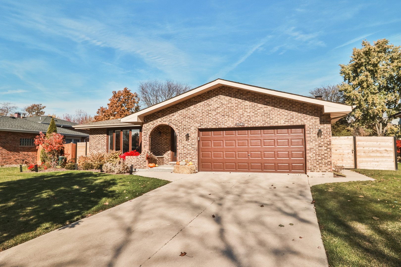 3240 Pitcher Drive Darien, IL 60561 - Photo 1 of 43 a front view of a house with a yard