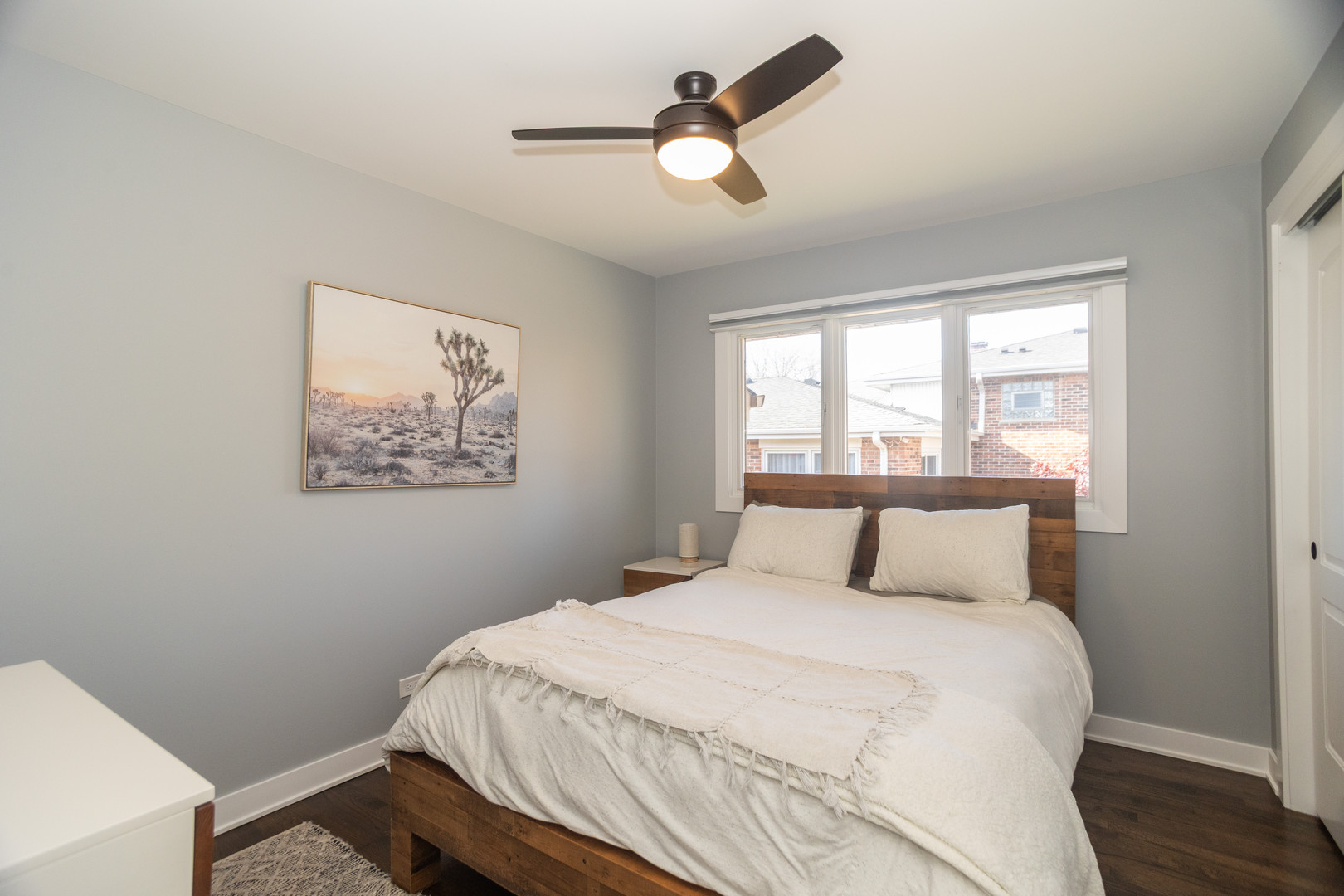 3240 Pitcher Drive Darien, IL 60561 - Photo 22 of 43 a bedroom with a bed and a painting on the wall