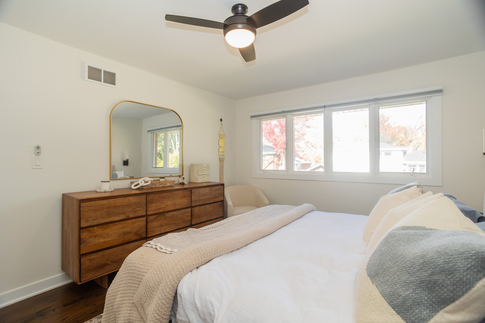 3240 Pitcher Drive Darien, IL 60561 - Photo 25 of 43 a bedroom with a bed and window with chair