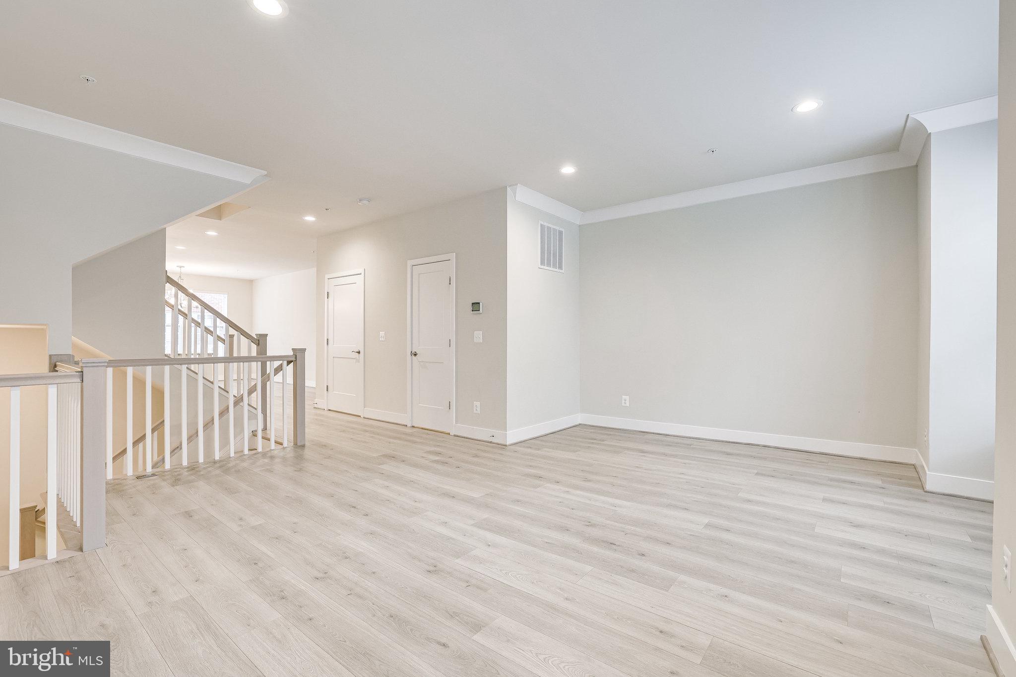 1953 Roland Clarke Place, Unit 30 Reston, VA 20191 - Photo 17 of 84 MAIN LEVEL FAMILYROOM