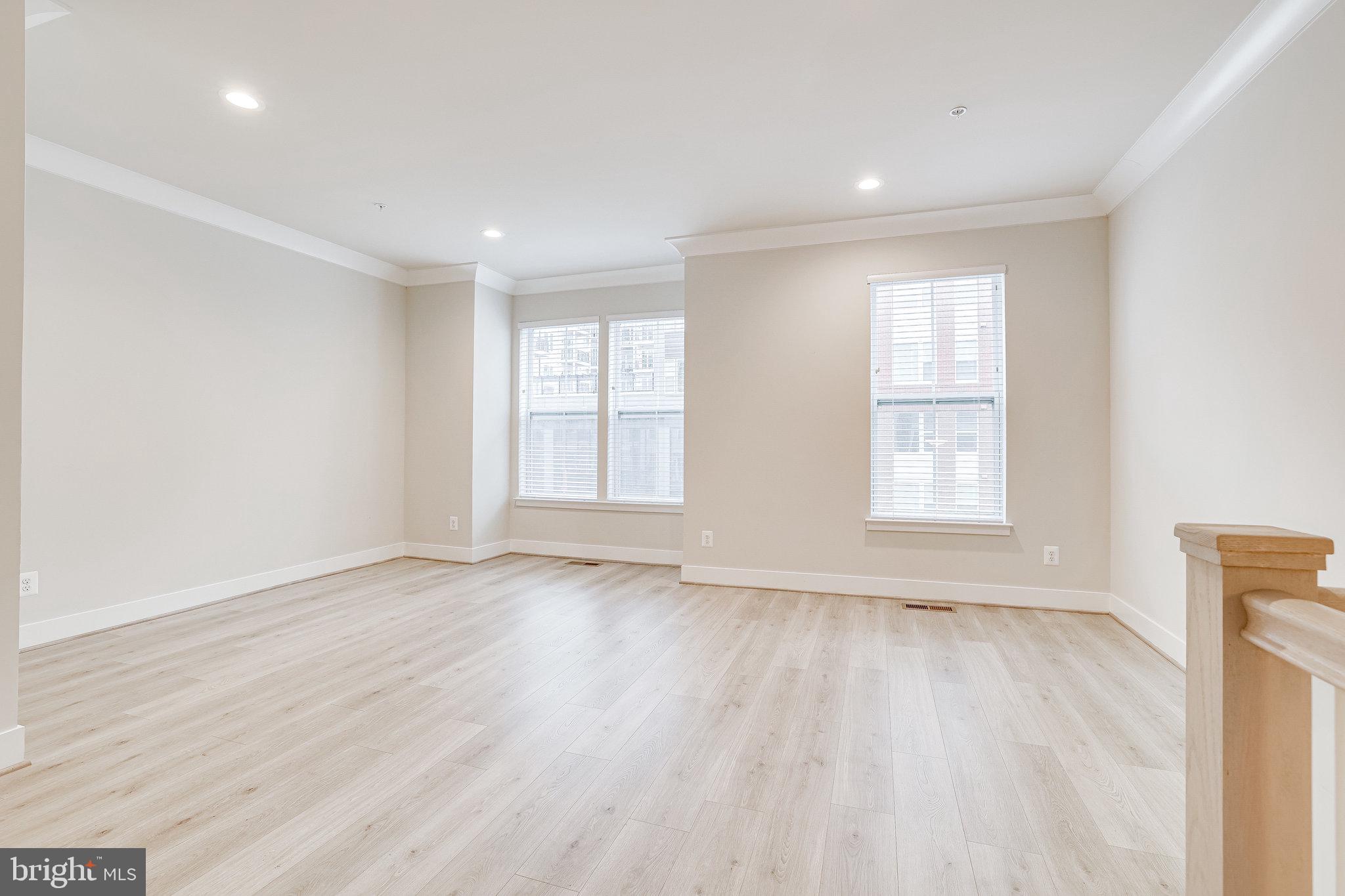 1953 Roland Clarke Place, Unit 30 Reston, VA 20191 - Photo 18 of 84 MAIN LEVEL FAMILYROOM
