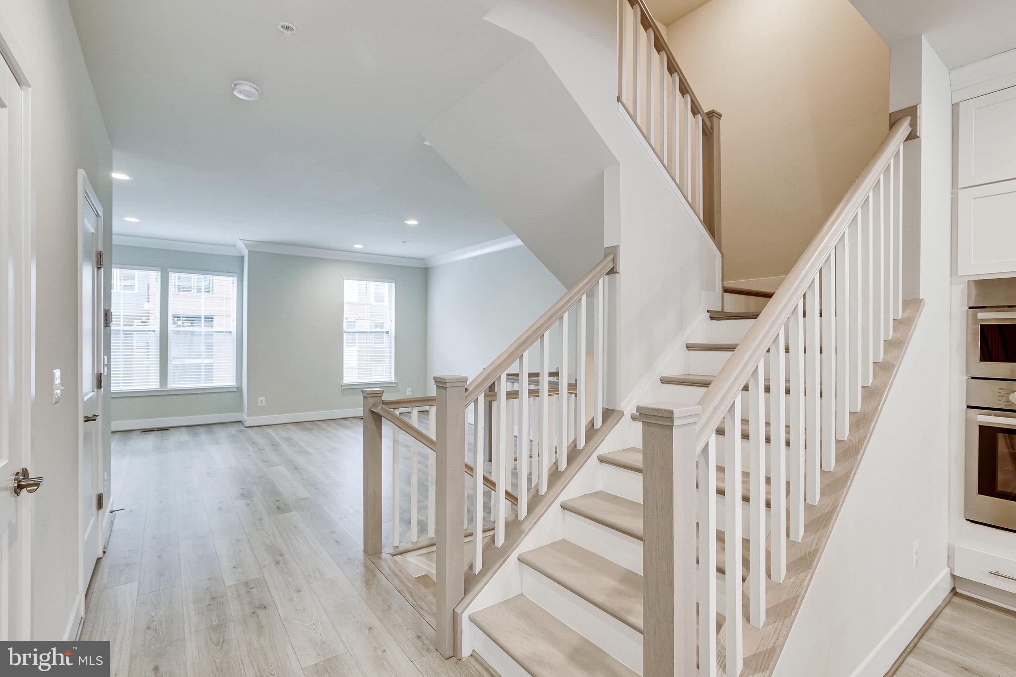 1953 Roland Clarke Place, Unit 30 Reston, VA 20191 - Photo 21 of 84 FAMILYROOM ON MAIN LEVEL