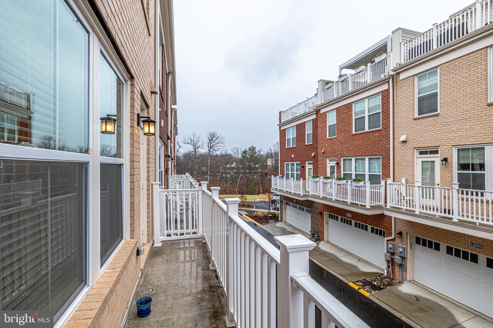 1953 Roland Clarke Place, Unit 30 Reston, VA 20191 - Photo 75 of 84 KITCHEN BALCONY