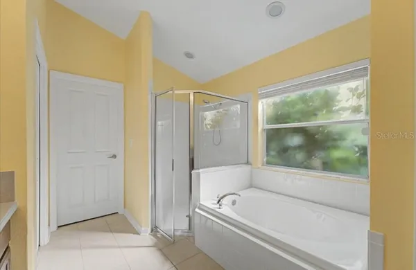 a bathroom with a sink a vanity and a mirror