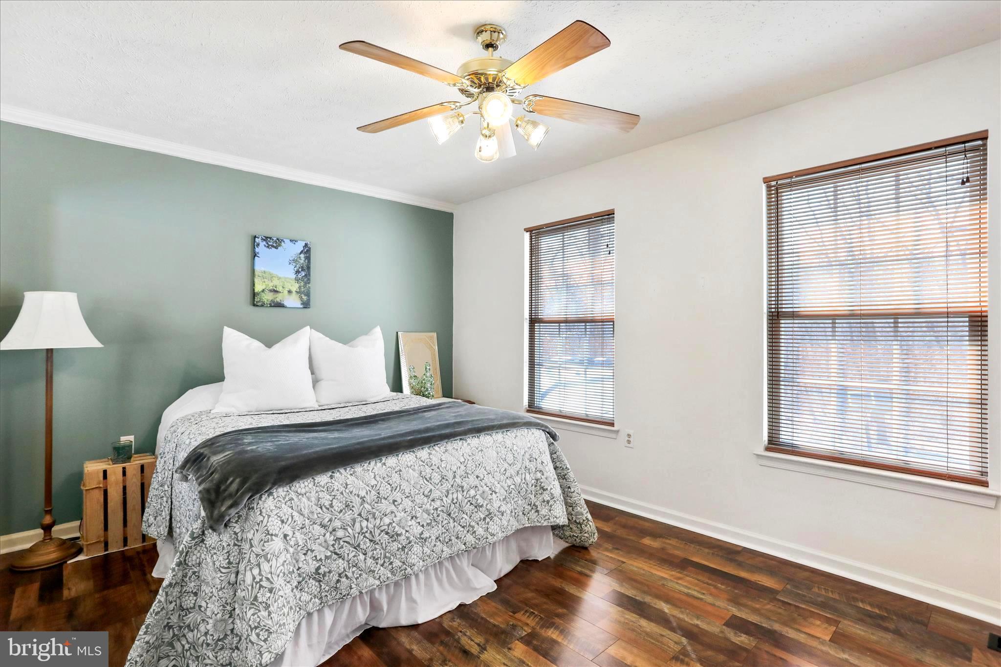 573 Lewis Street Front Royal, VA 22630 - Photo 23 of 45 a bedroom with a large bed and a window