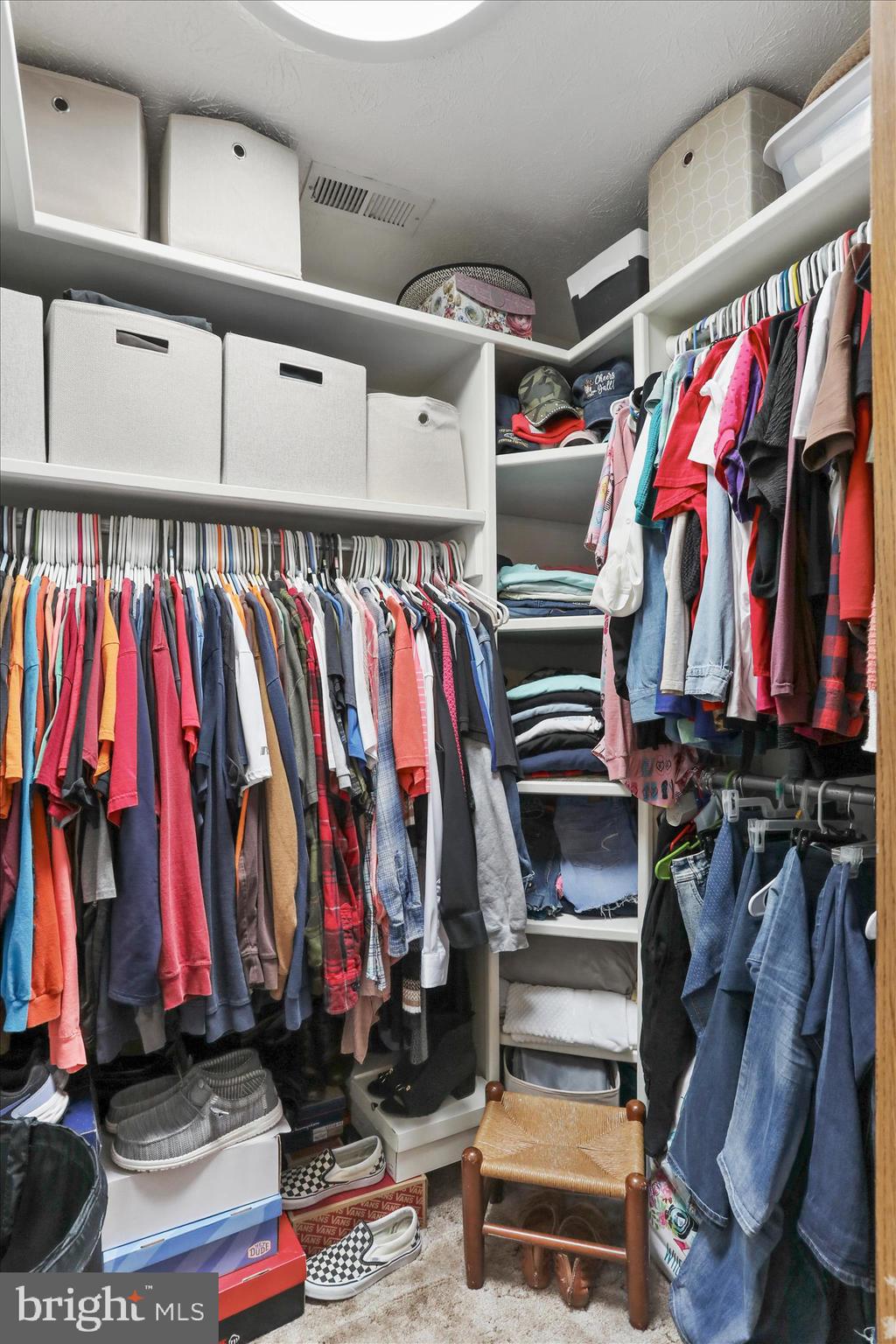 573 Lewis Street Front Royal, VA 22630 - Photo 28 of 45 a view of walk in closet with clothes