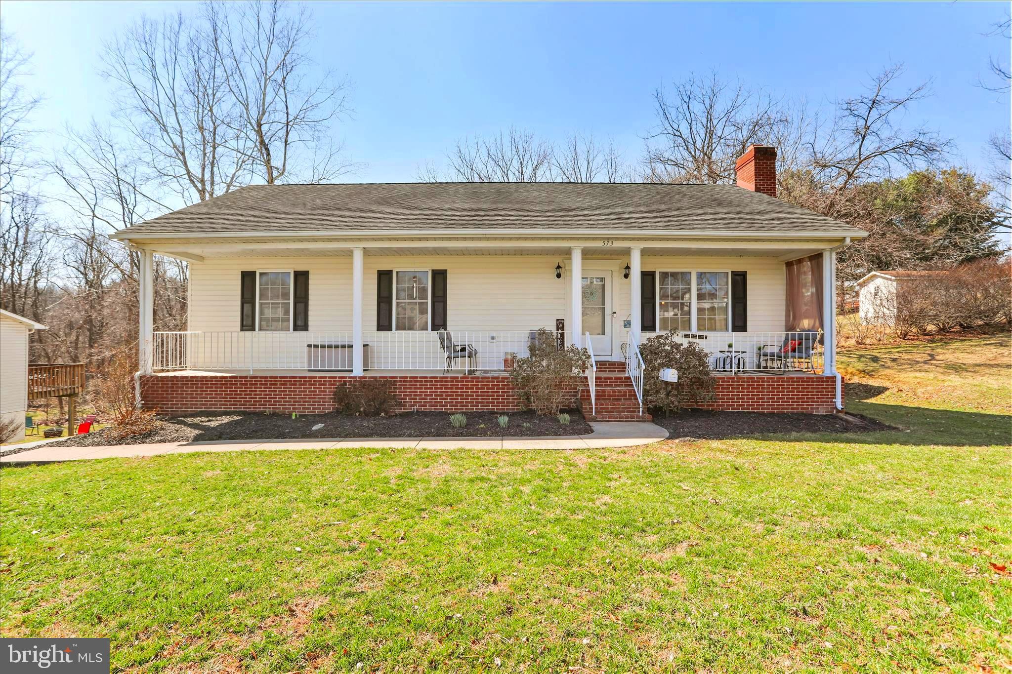 573 Lewis Street Front Royal, VA 22630 - Photo 3 of 45 a view of a house with swimming pool and porch