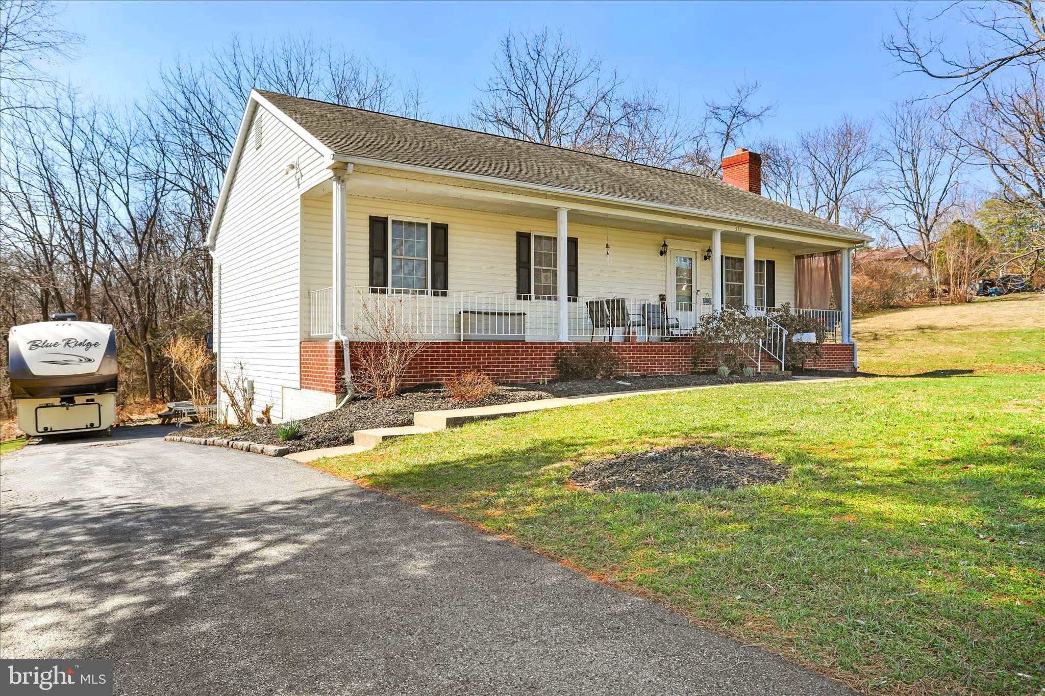 573 Lewis Street Front Royal, VA 22630 - Photo 43 of 45 a view of a house with pool and sitting area
