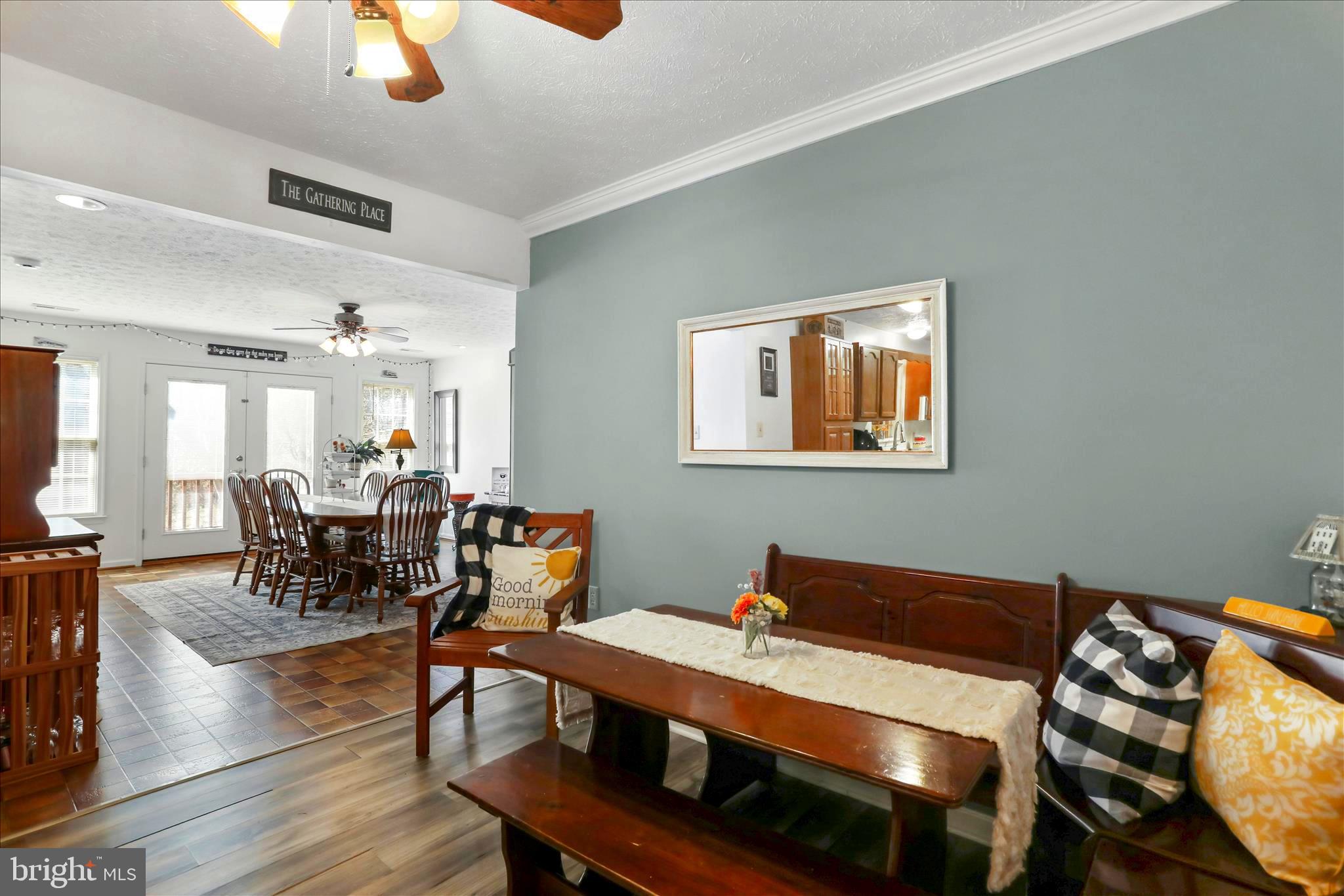 573 Lewis Street Front Royal, VA 22630 - Photo 6 of 45 a view of a dining room with furniture window and wooden floor