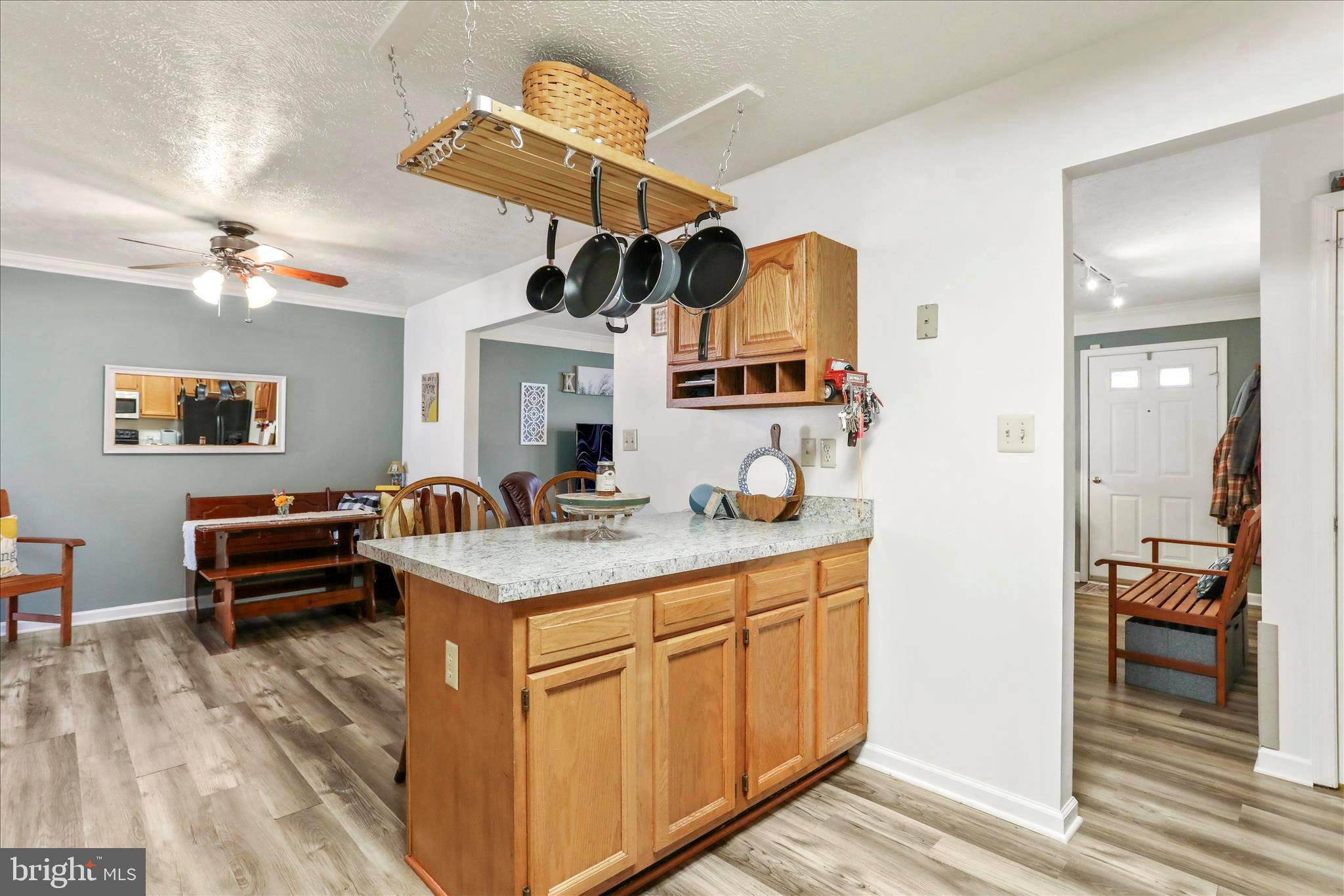 573 Lewis Street Front Royal, VA 22630 - Photo 10 of 45 a kitchen with cabinets a sink and appliances