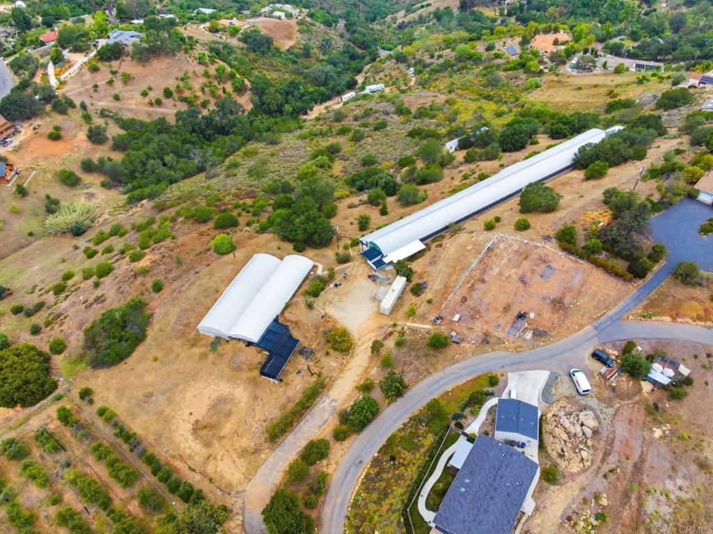 803 Quail Hill Road Fallbrook, CA 92028 - Photo 26 of 36 an aerial view of a house a yard and mountain