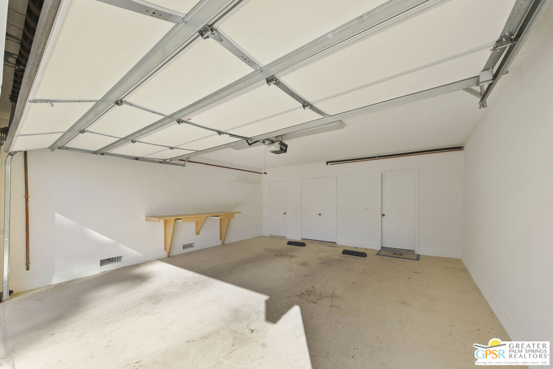 2296 Paseo Del Rey Palm Springs, CA 92264 - Photo 22 of 42 a view of a room with rack on the wall