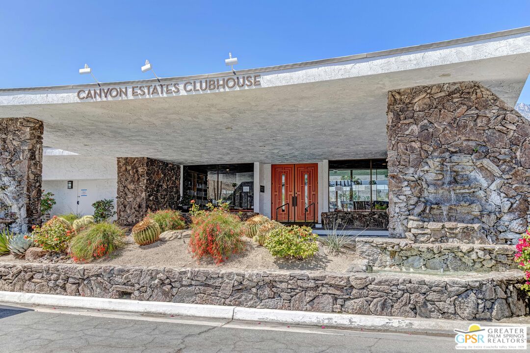 2296 Paseo Del Rey Palm Springs, CA 92264 - Photo 27 of 42 a front view of a house with a yard