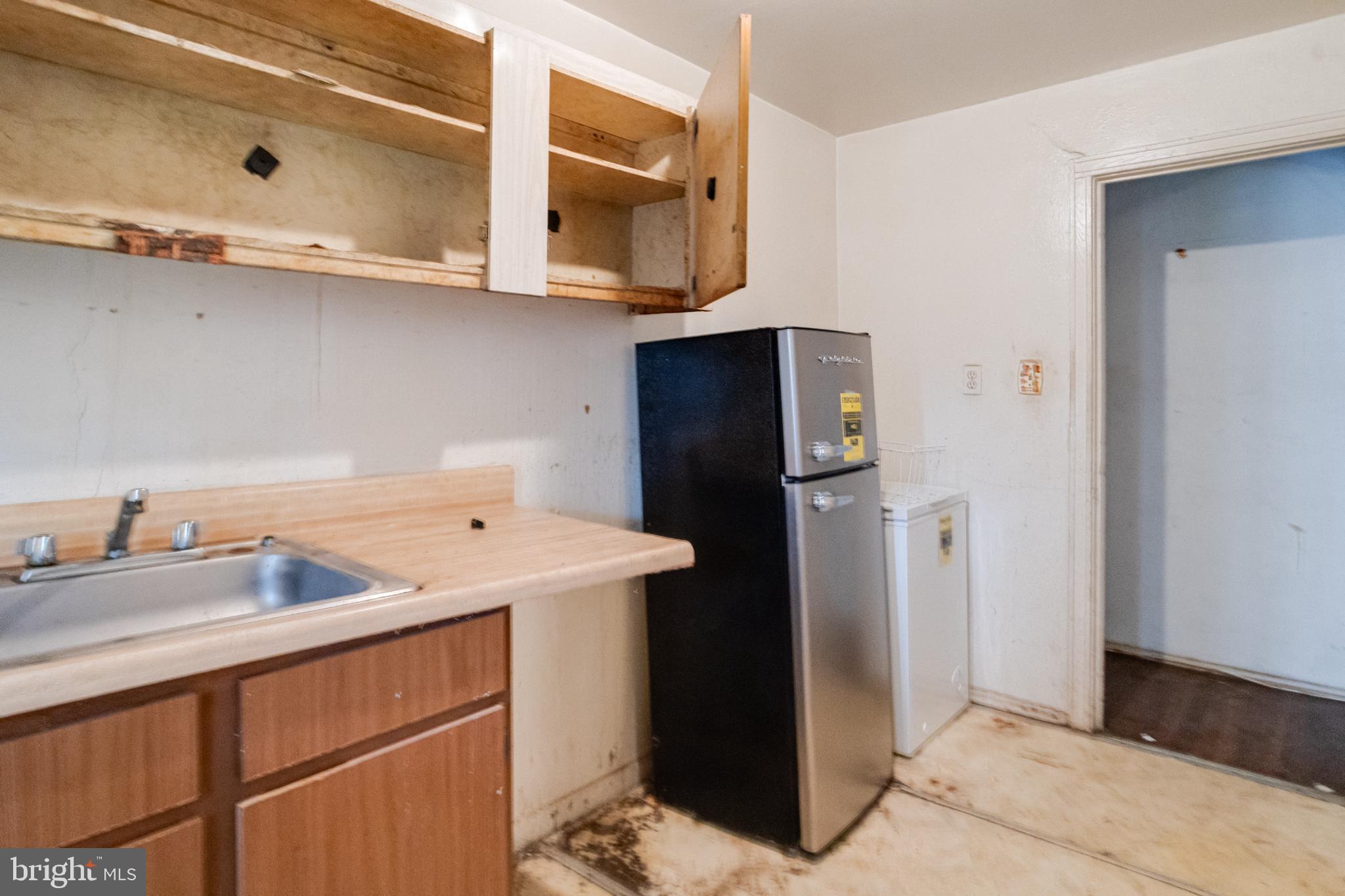 4209 Chatham Road Baltimore, MD 21207 - Photo 11 of 37 a room with storage and utility