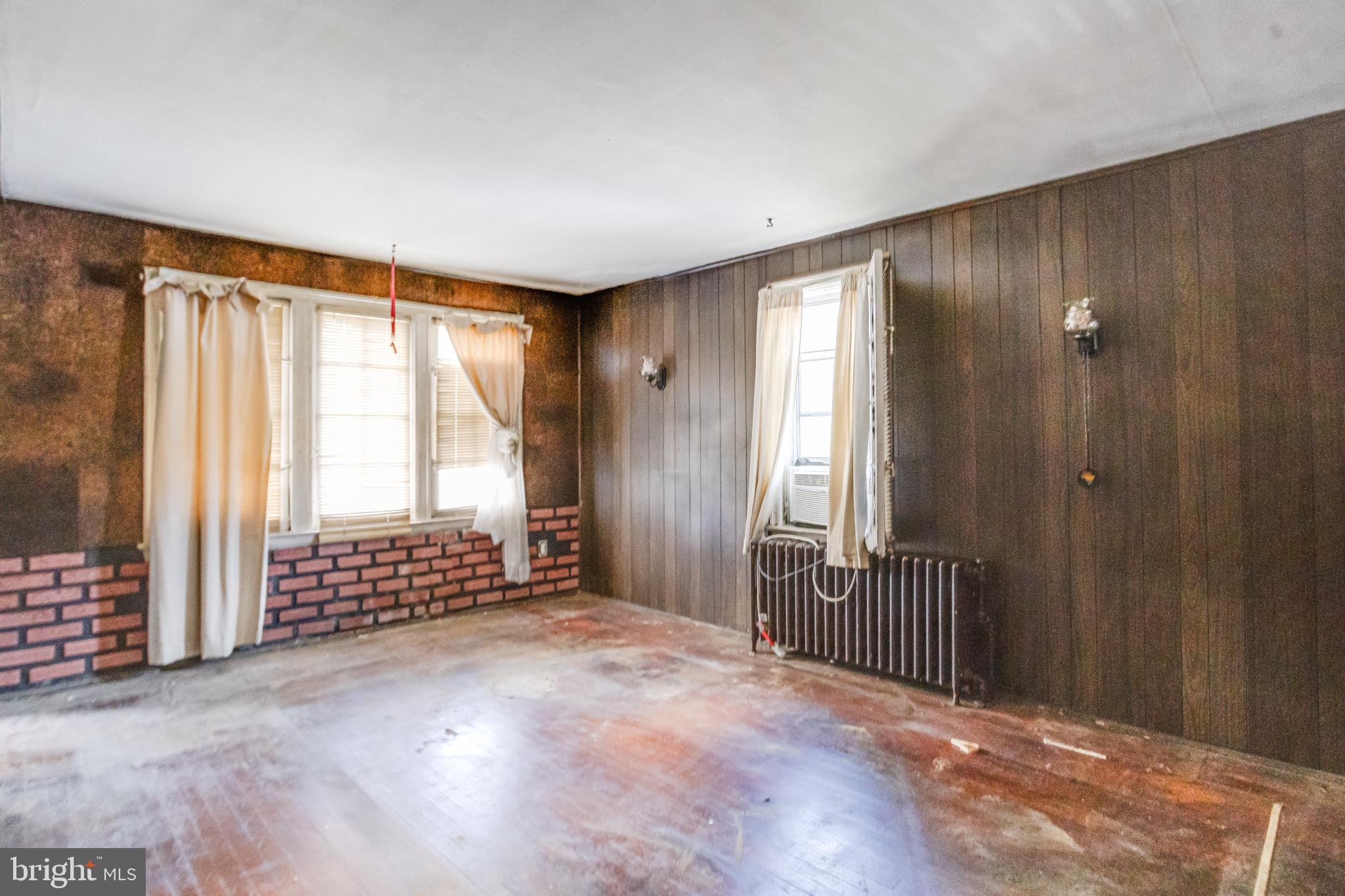 4209 Chatham Road Baltimore, MD 21207 - Photo 13 of 37 an empty room with windows