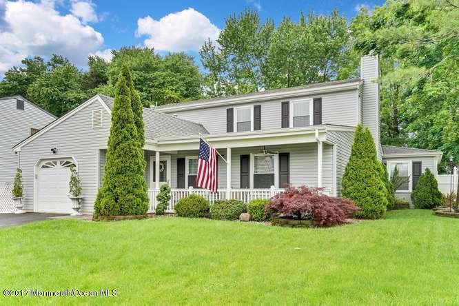 48 Peachstone Road Howell, NJ 07731 - Photo 1 of 24 a front view of a house with garden