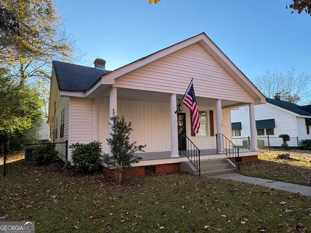 a house view with a garden space