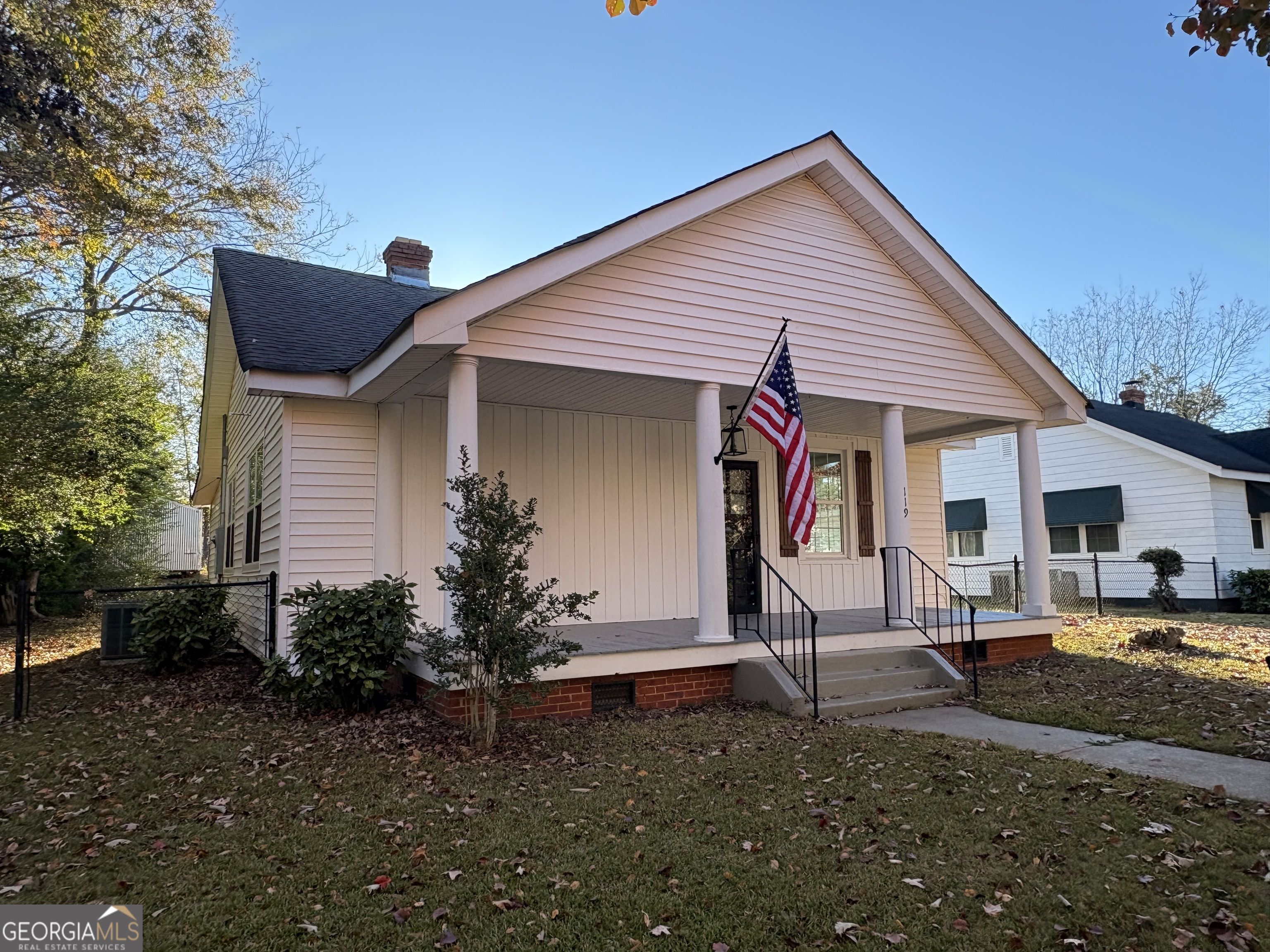 a house view with a garden space