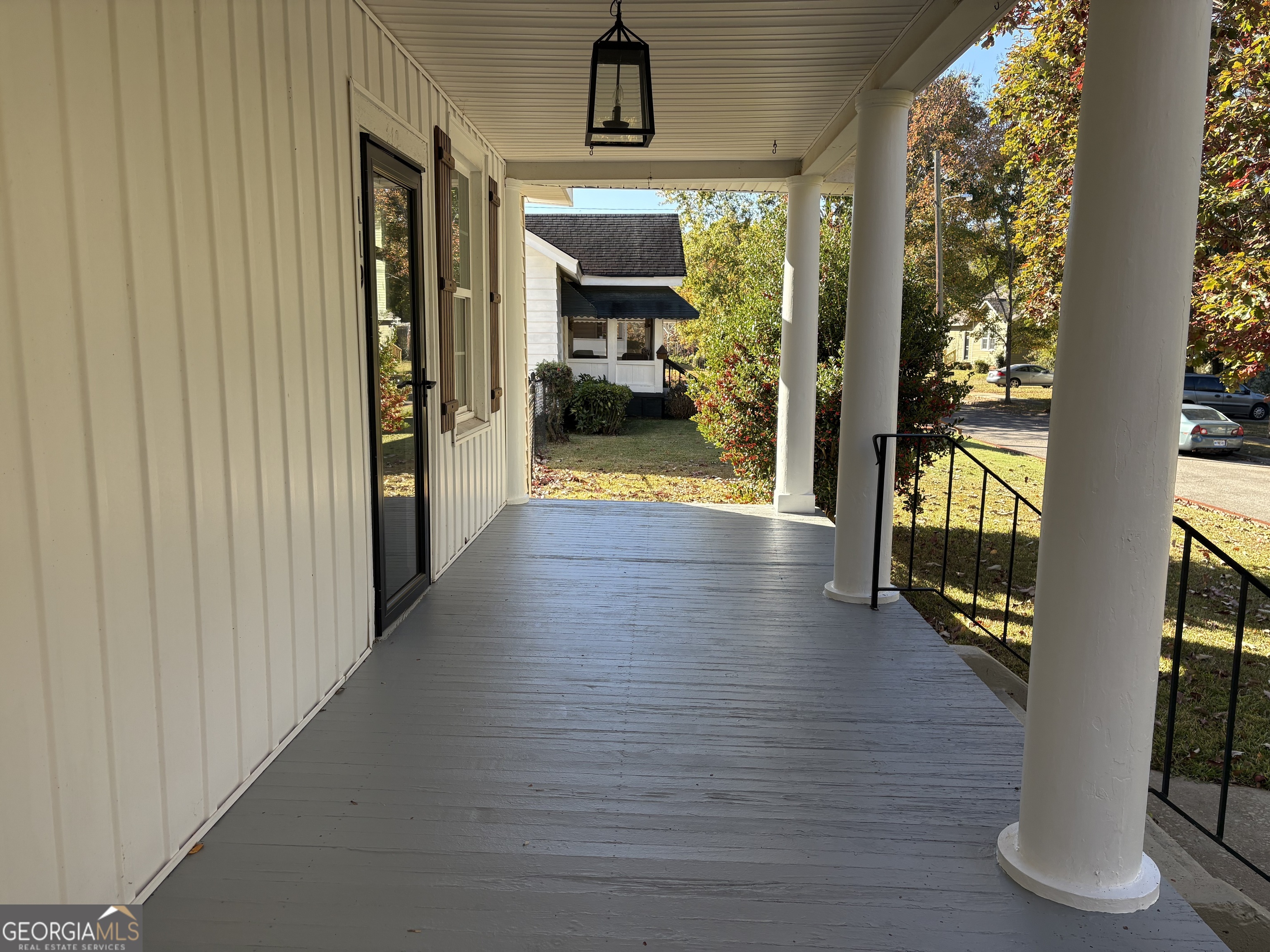 119 S Street Northwest Thomaston, GA 30286 - Photo 5 of 31 a view of hallway with livingroom and wooden floor