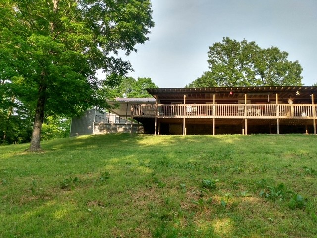 317 Day Lane Tennessee Ridge, TN 37178 - Photo 2 of 31 a view of a house with a backyard