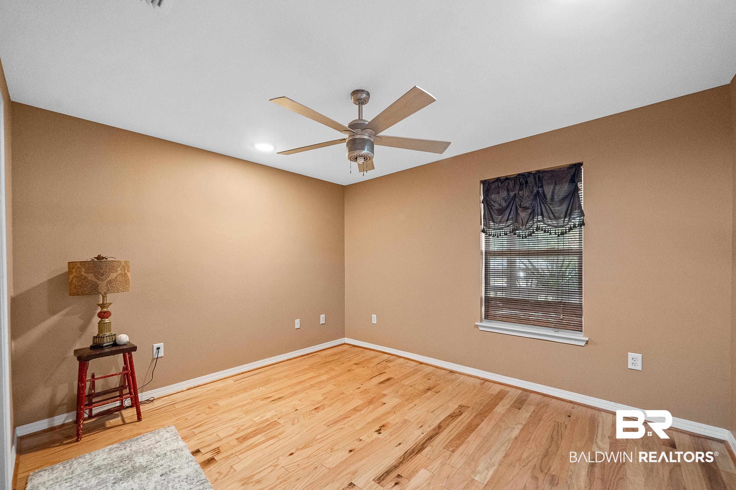 11528 Whitehouse Fork Road Bay Minette, AL 36507 - Photo 14 of 37 Empty room featuring light wood finished floors, recessed lighting, and a ceiling fan