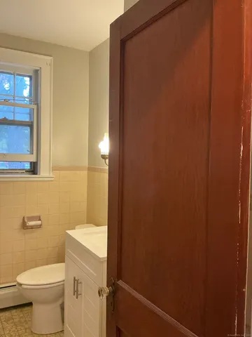 a bathroom with a sink and a toilet