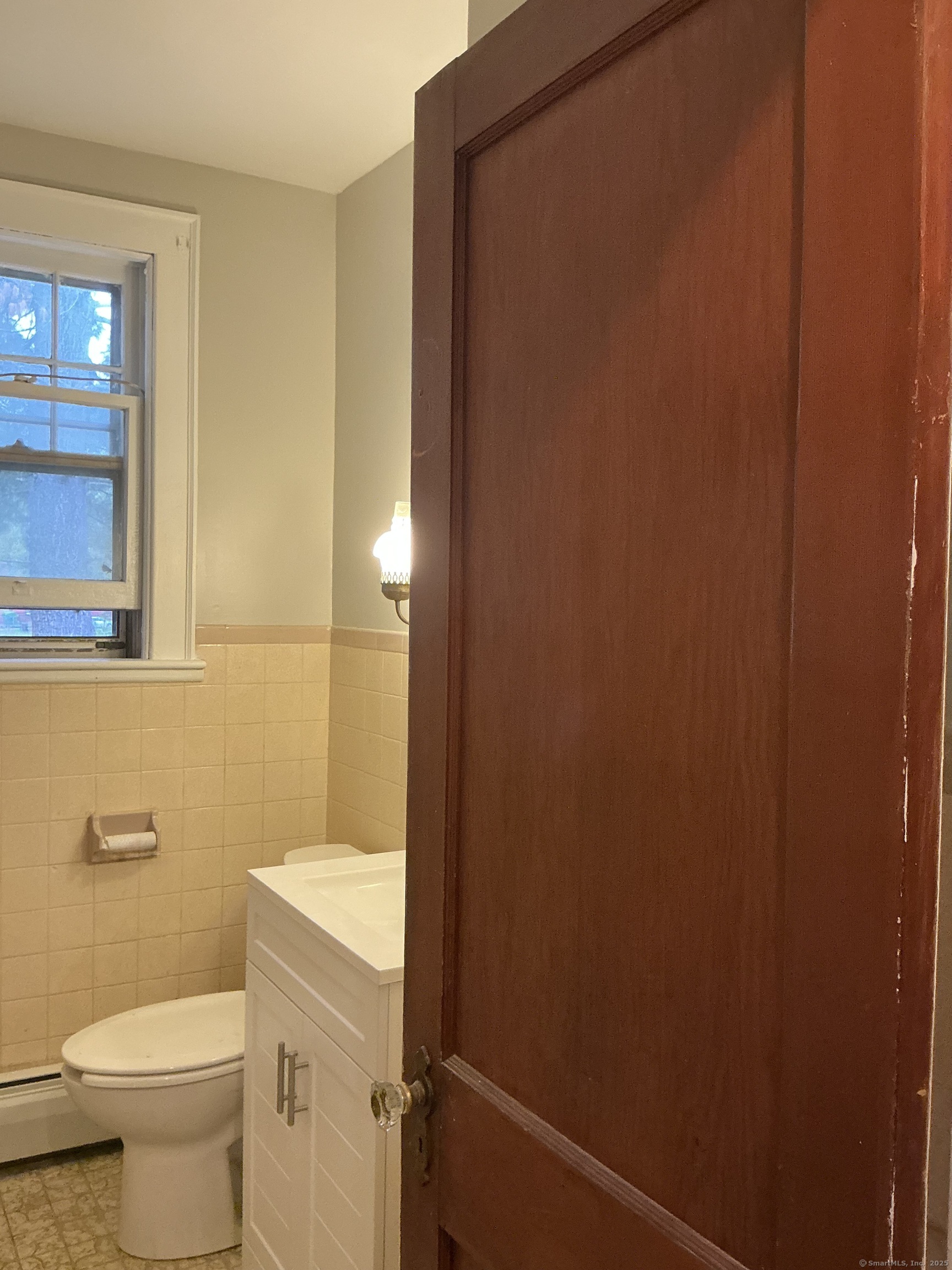 73 Stack Street Middletown, CT 06457 - Photo 13 of 18 a bathroom with a sink and a toilet