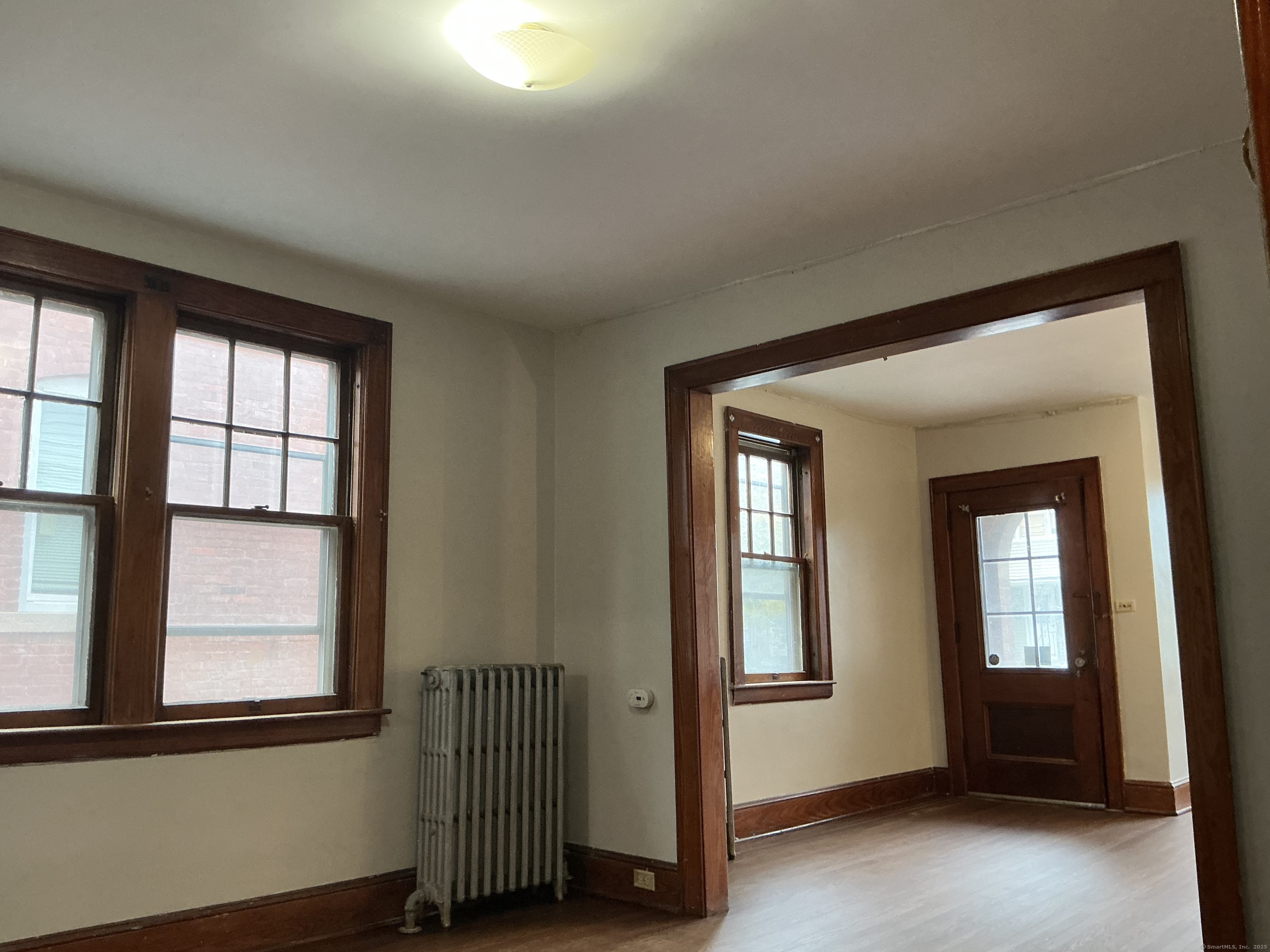73 Stack Street Middletown, CT 06457 - Photo 7 of 18 an empty room with windows