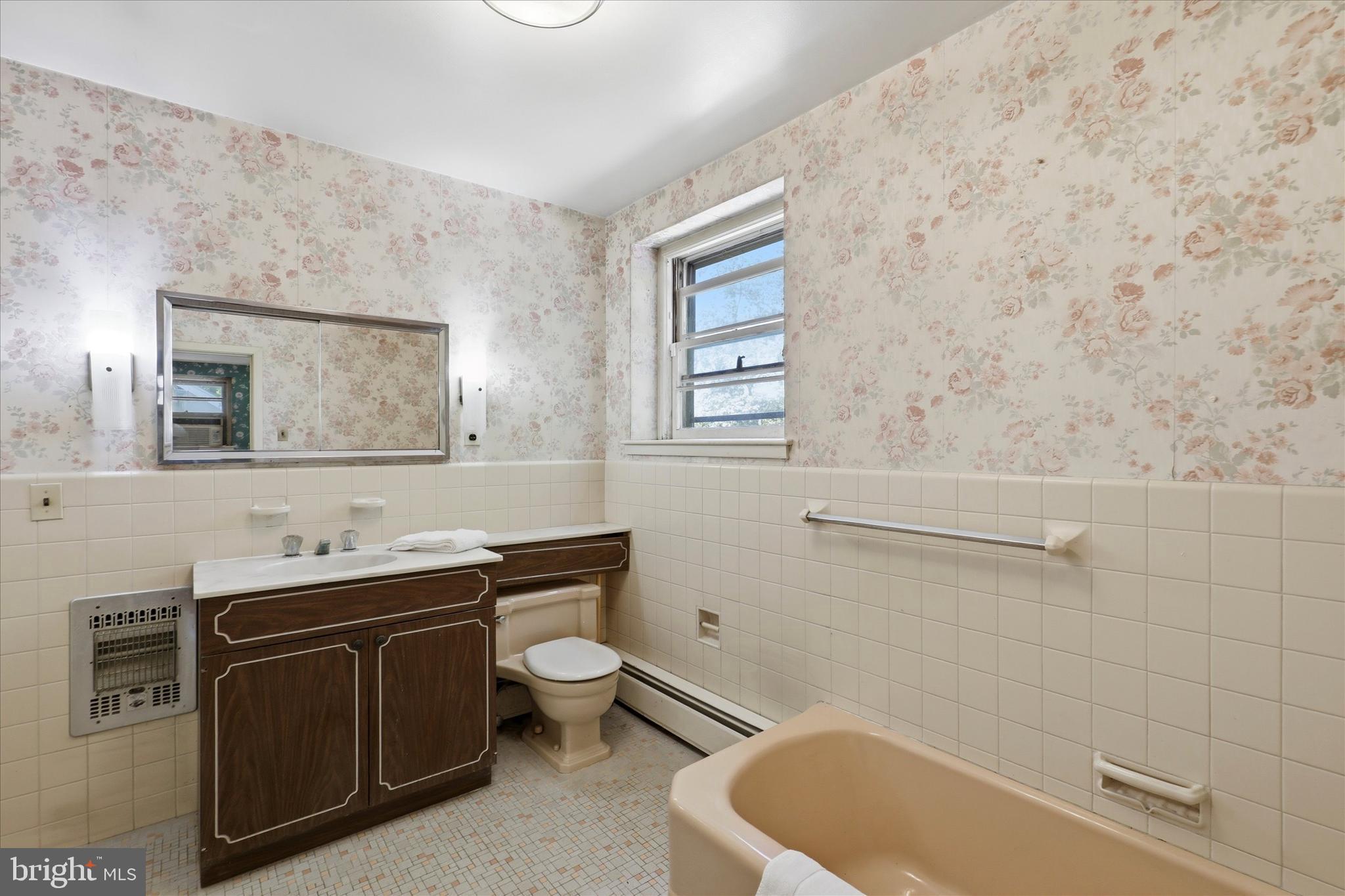 412 Newbold Road Jenkintown, PA 19046 - Photo 11 of 17 a bathroom with a sink a toilet and mirror