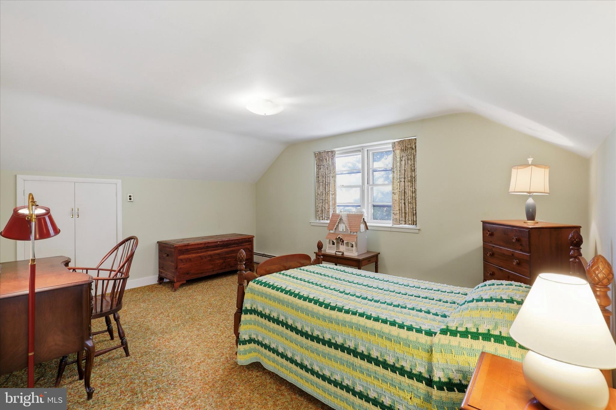 412 Newbold Road Jenkintown, PA 19046 - Photo 14 of 17 a bedroom with a bed and wooden floor