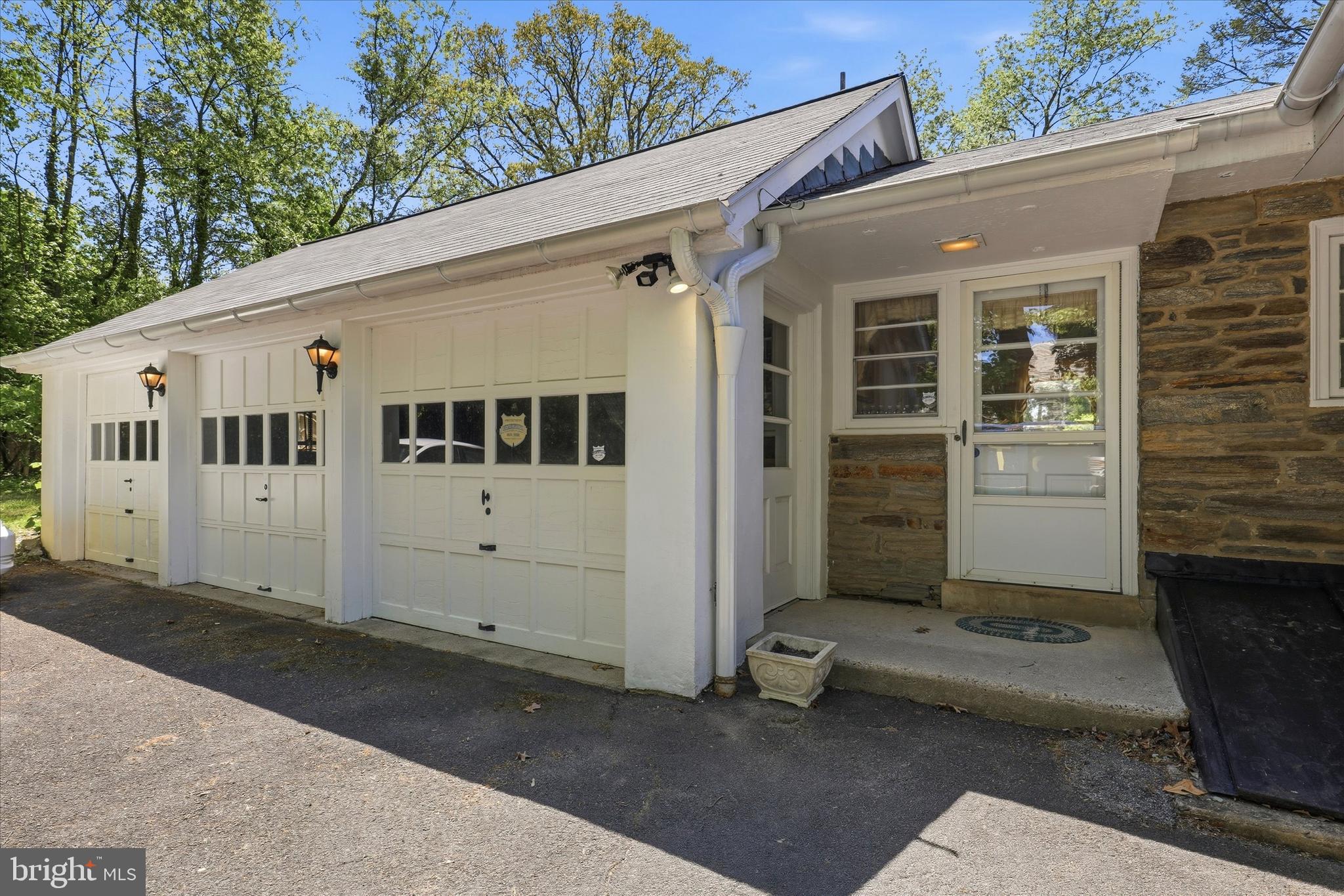 412 Newbold Road Jenkintown, PA 19046 - Photo 3 of 17 a front view of a house with a garage
