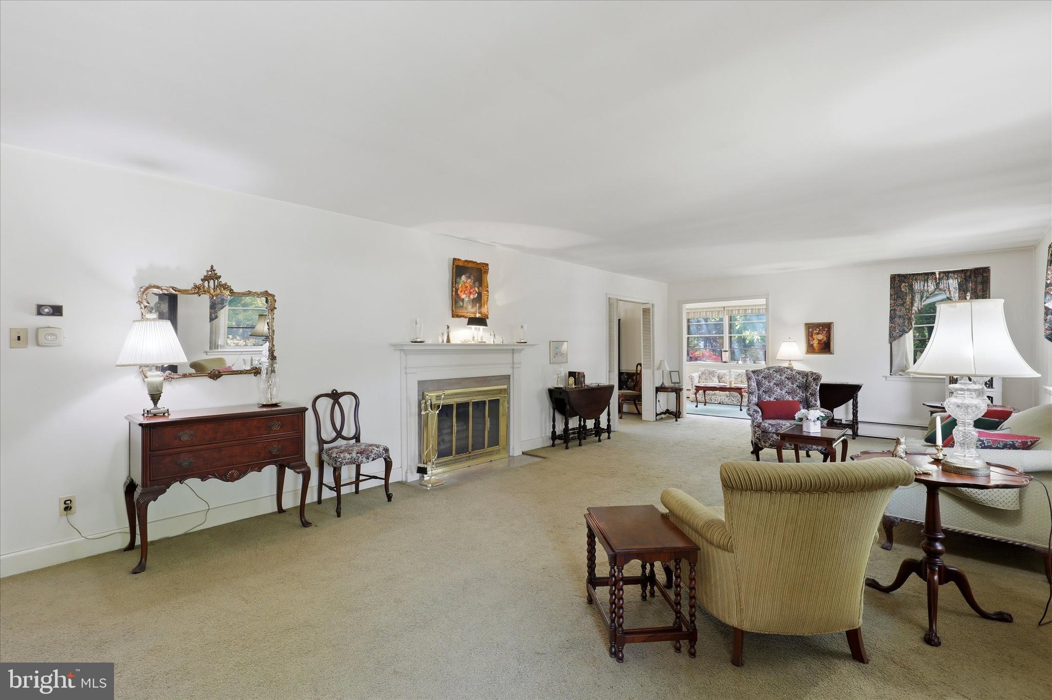 412 Newbold Road Jenkintown, PA 19046 - Photo 4 of 17 a living room with furniture and a fireplace