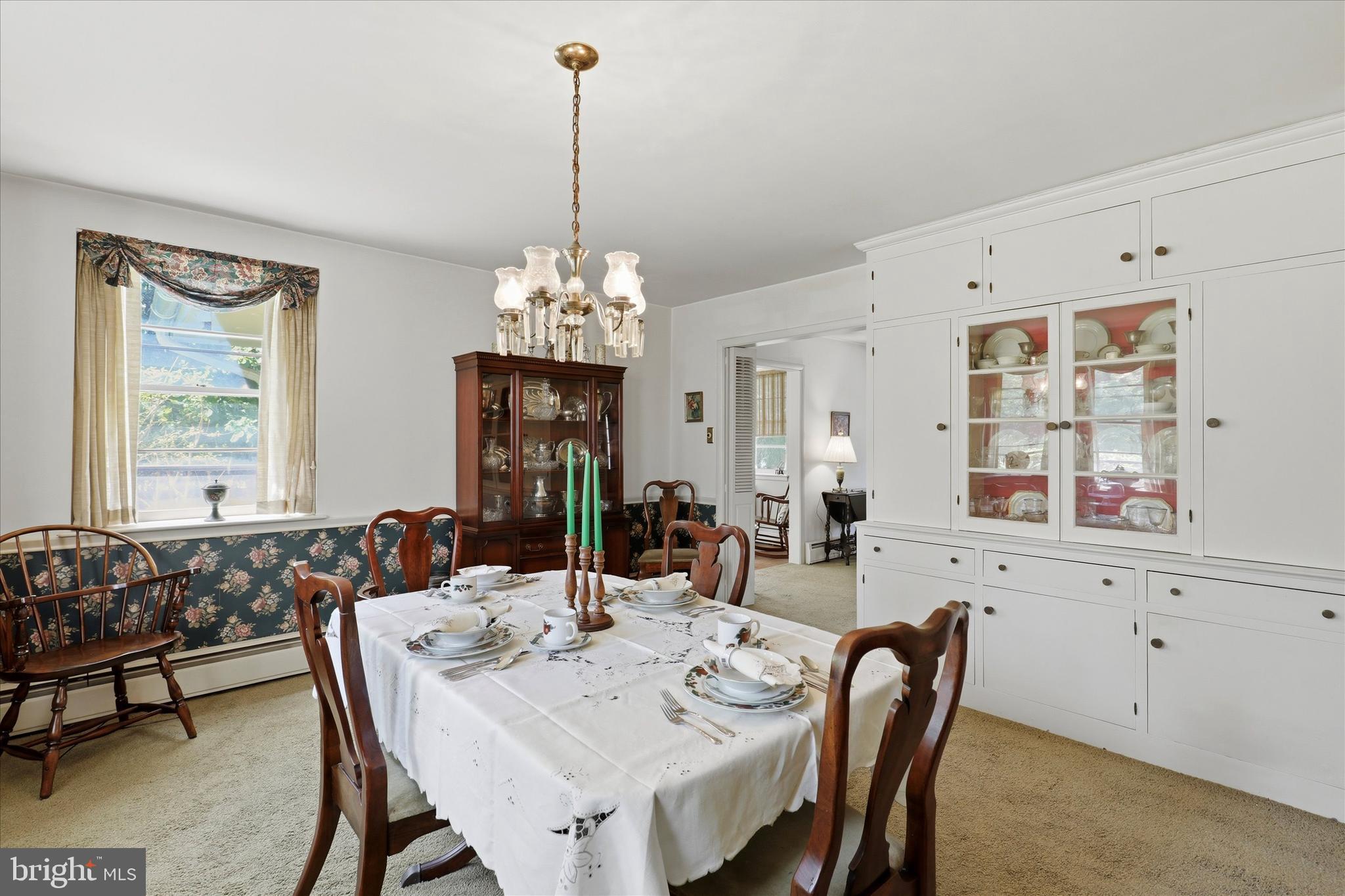 412 Newbold Road Jenkintown, PA 19046 - Photo 6 of 17 a view of a dining room with furniture and chandelier