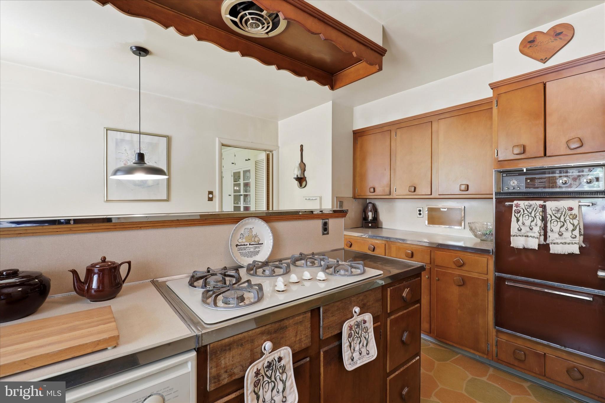 412 Newbold Road Jenkintown, PA 19046 - Photo 8 of 17 a kitchen with a stove and a sink