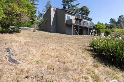 a house view with a outdoor space