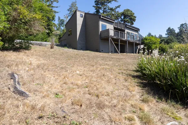 a house view with a outdoor space