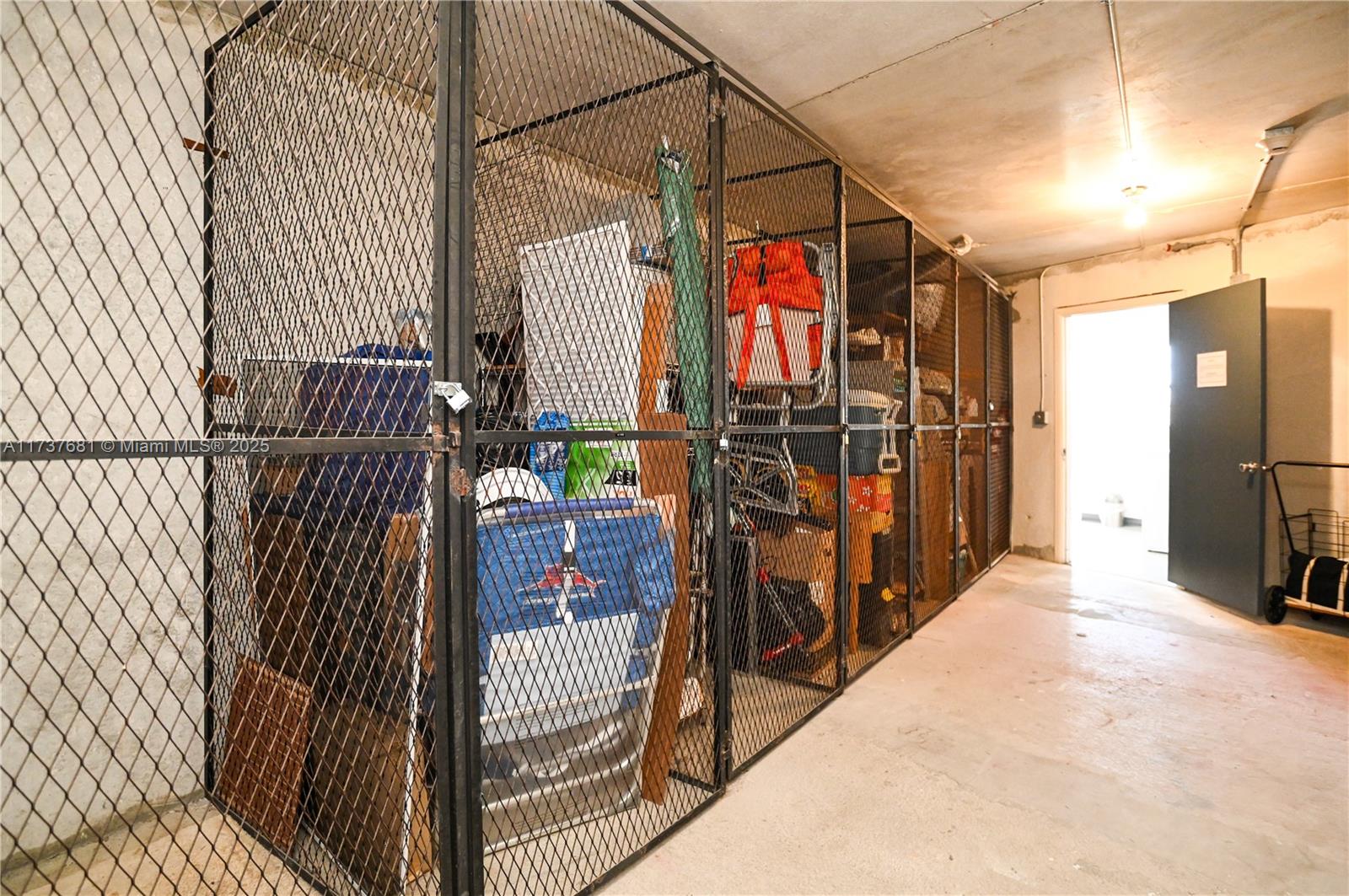4110 Oakridge V, Unit 4110 Deerfield Beach, FL 33442 - Photo 45 of 63 a view of a walk in closet