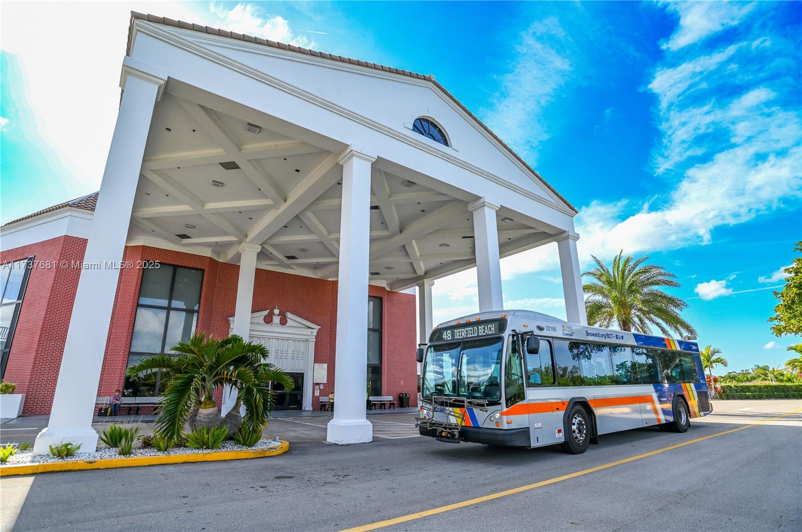 4110 Oakridge V, Unit 4110 Deerfield Beach, FL 33442 - Photo 63 of 63 a car parked in front of a building