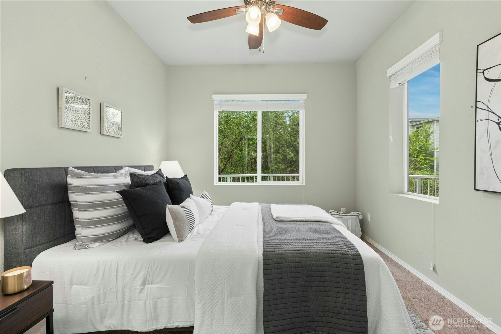 14915 38th Drive Southeast, Unit II1033 Bothell, WA 98012 - Photo 16 of 25 a bedroom with a large bed and a window