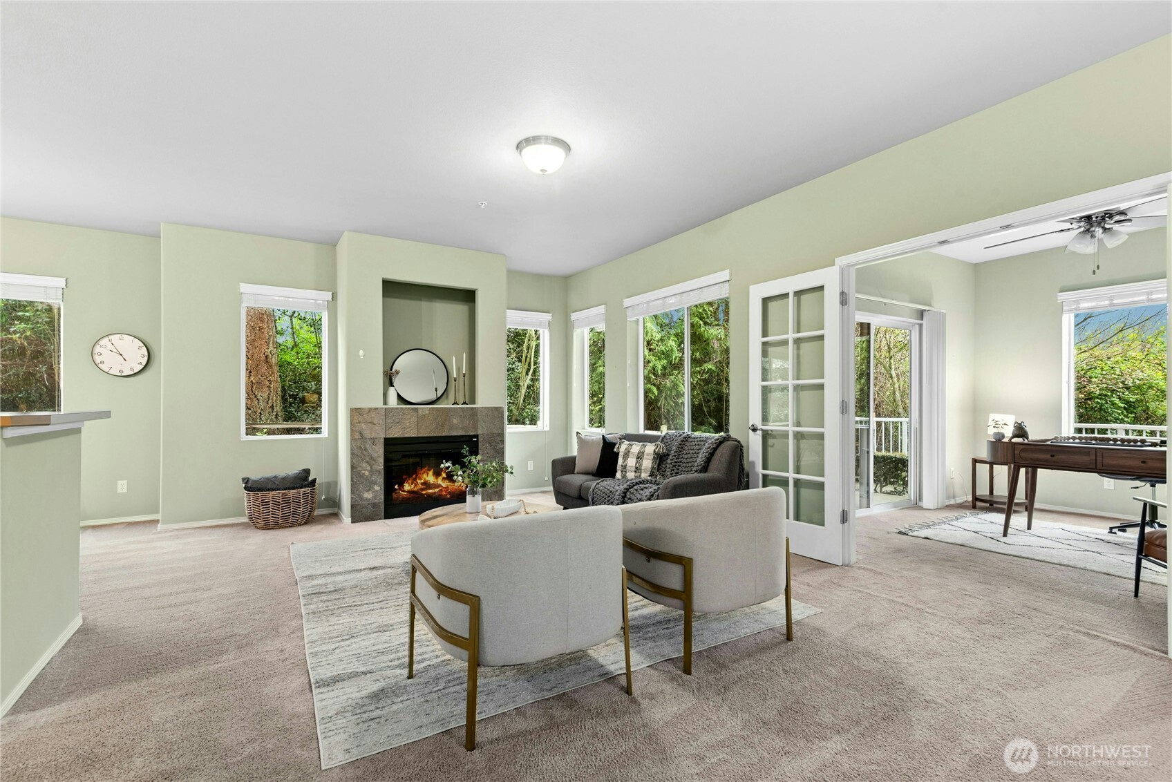 14915 38th Drive Southeast, Unit II1033 Bothell, WA 98012 - Photo 2 of 25 a living room with fireplace furniture and a fireplace