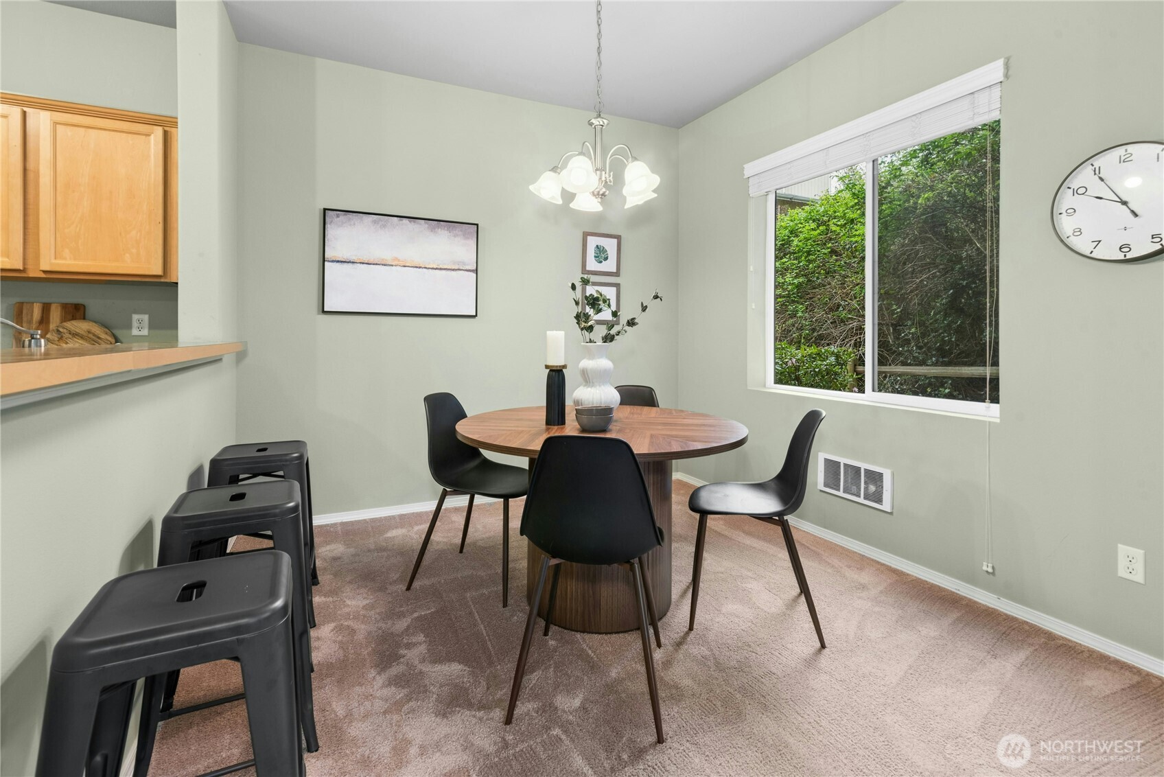 14915 38th Drive Southeast, Unit II1033 Bothell, WA 98012 - Photo 9 of 25 a dining room with furniture and window
