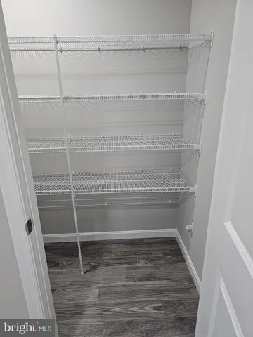 a view of a room with racks on the wall