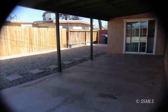 329 Lenore Street Ridgecrest, CA 93555 - Photo 25 of 28 a view of an empty room with a window