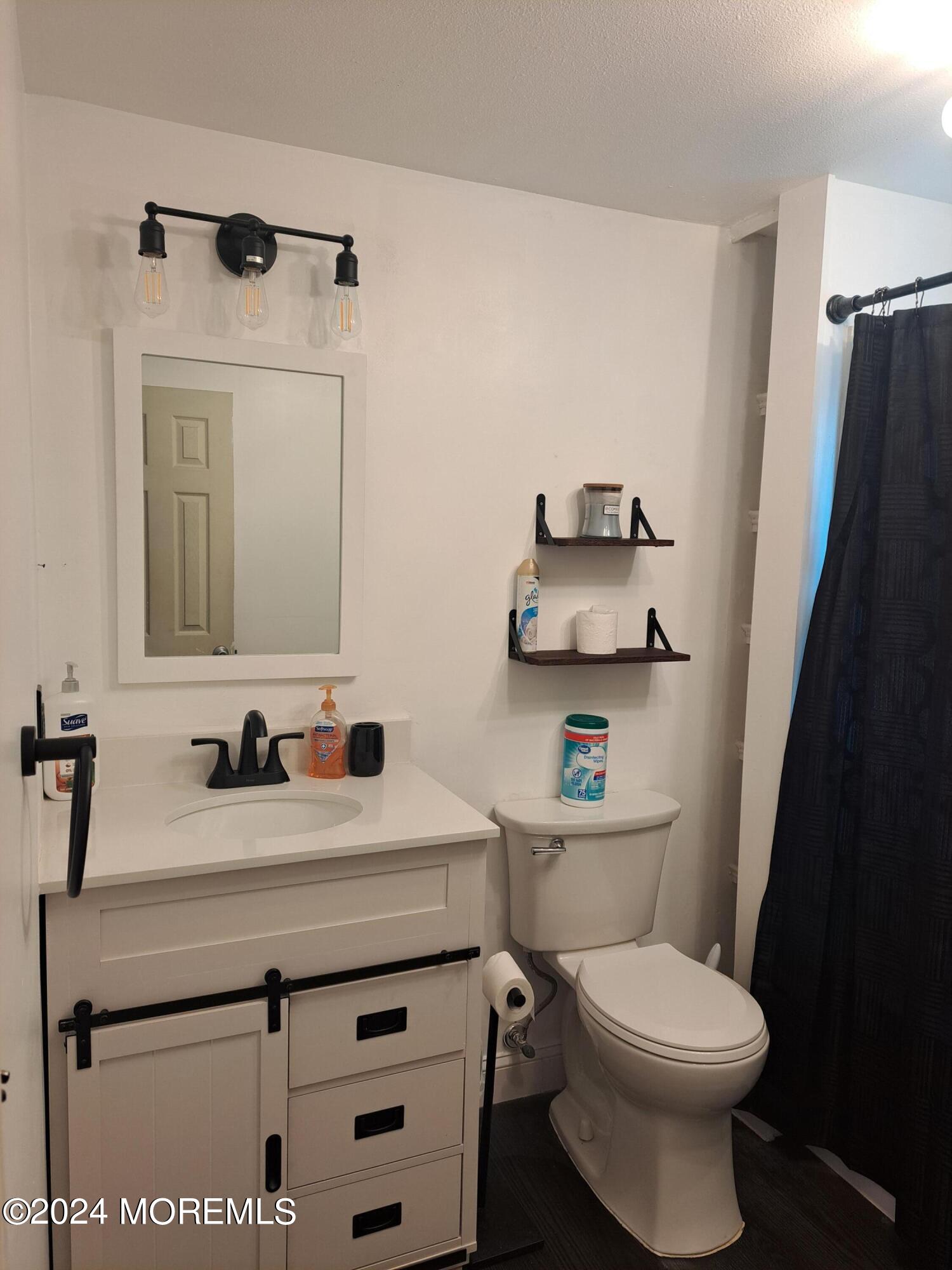 404 Dover Road Toms River, NJ 08757 - Photo 23 of 40 UPSTARIS BATHROOM 1