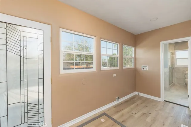 an empty room with windows