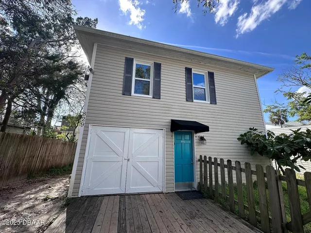 a view of a house with wooden floor