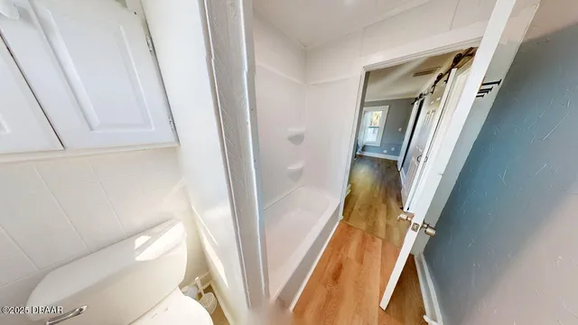 a bathroom with a sink and toilet