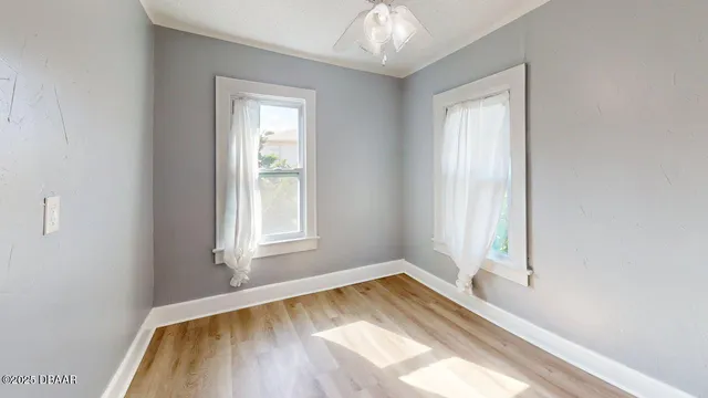 a view of a room that has a window in it