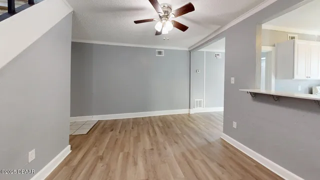 a view of entryway with wooden floor